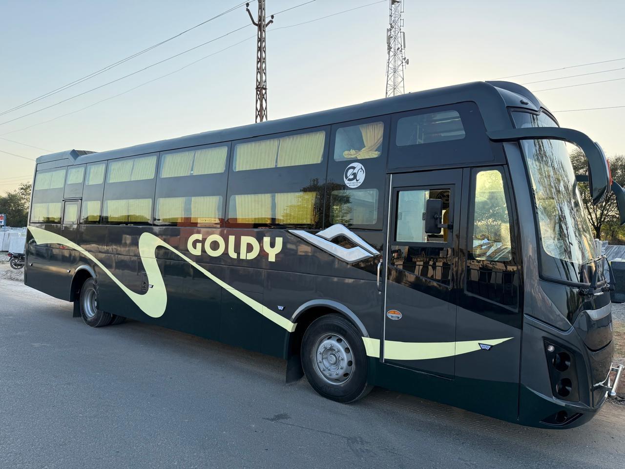 Front view of the Goldy bus parked outdoors