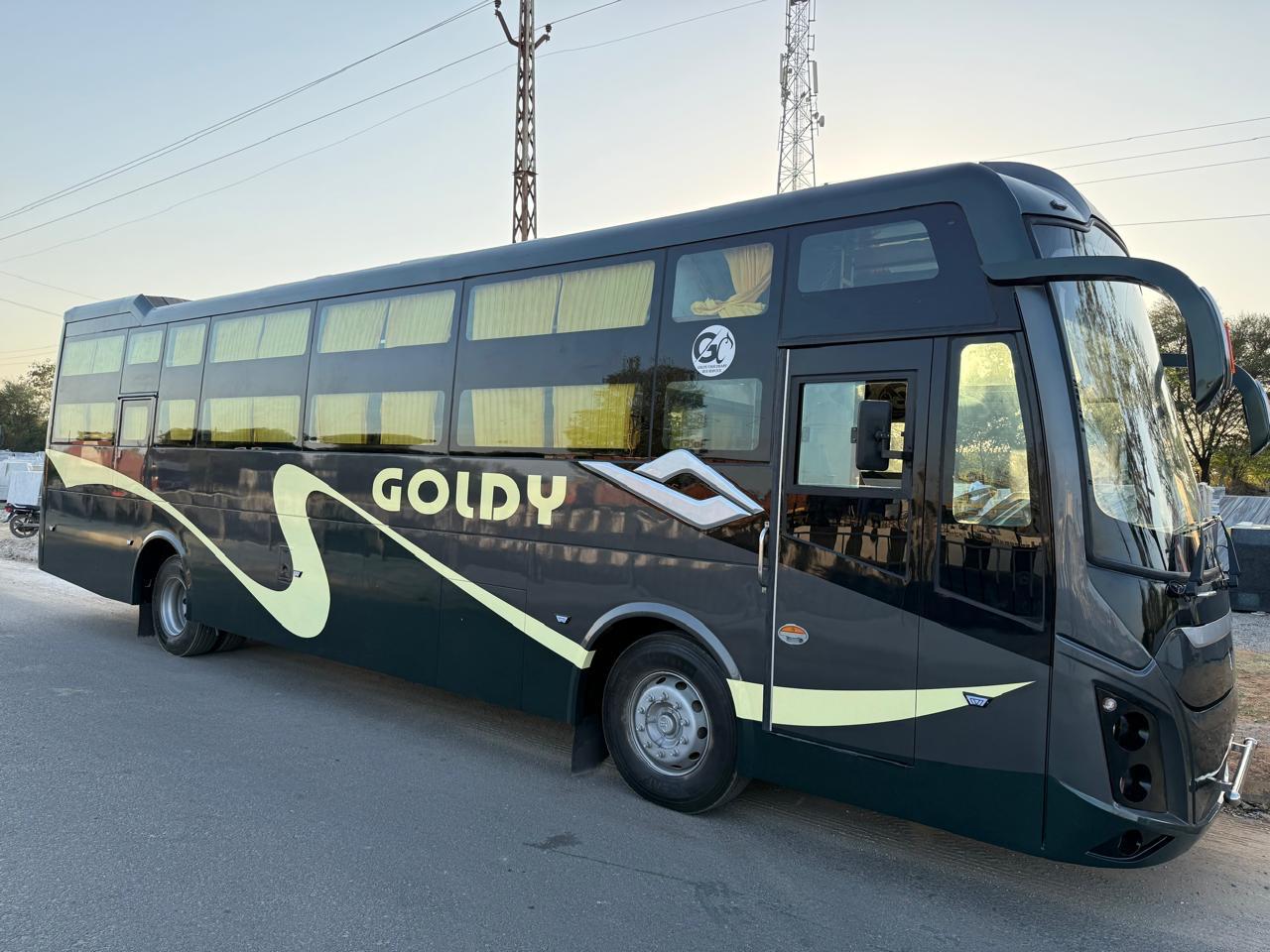 Full side profile of the Goldy bus